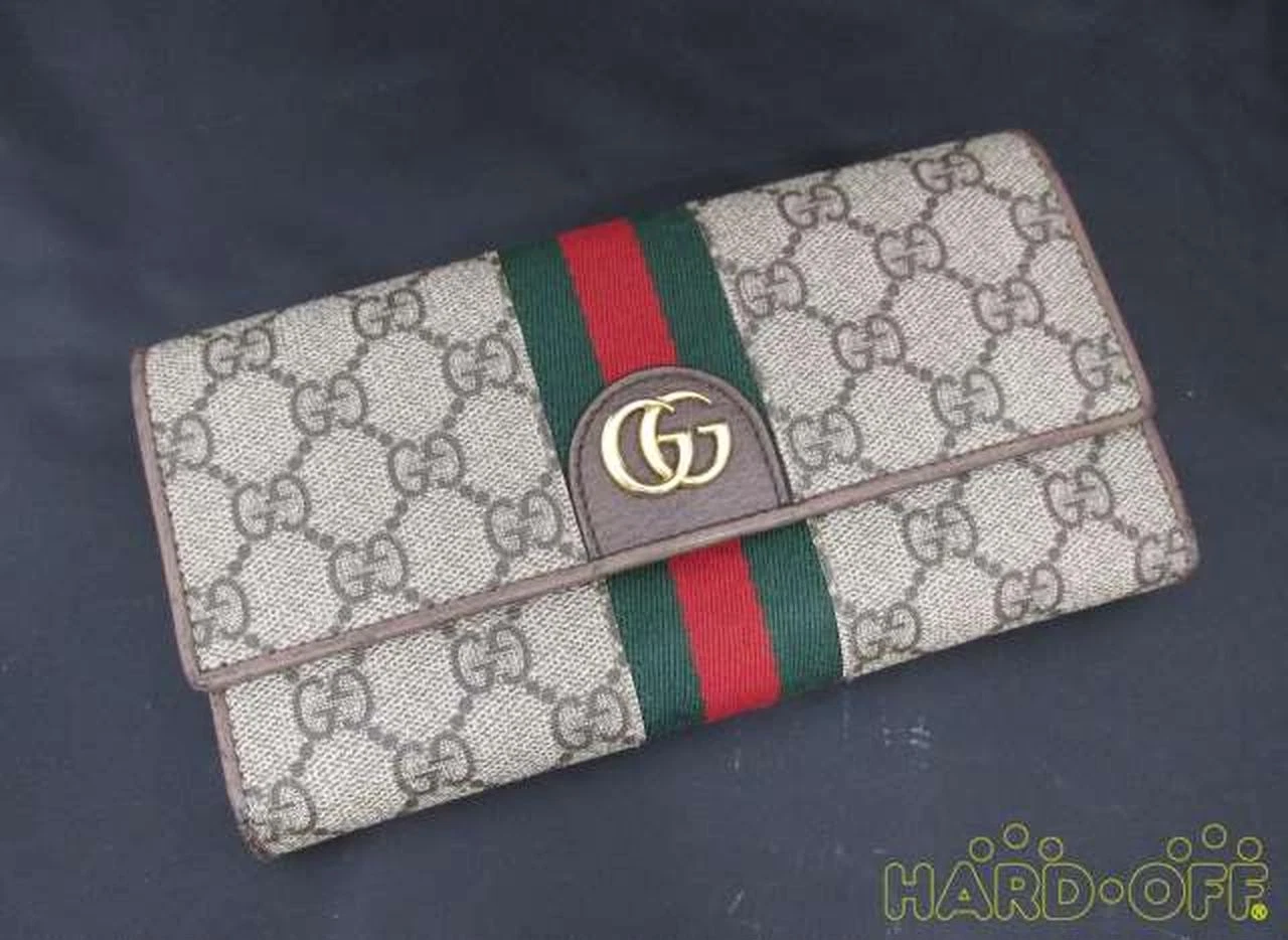 Portefeuille continental toile suprême GUCCI GG DISNEY numéro de modèle 557803 GUCCI G