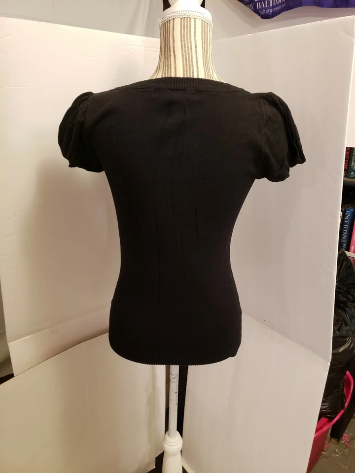 Suéter Negro Manga Corta Necessary Objects By Ady Gluck Frankel Talla Grande Foto 2 de 4