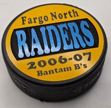 2006-07 Fargo North Raiders Bantam B's Commemorative Hockey Puck Gufex