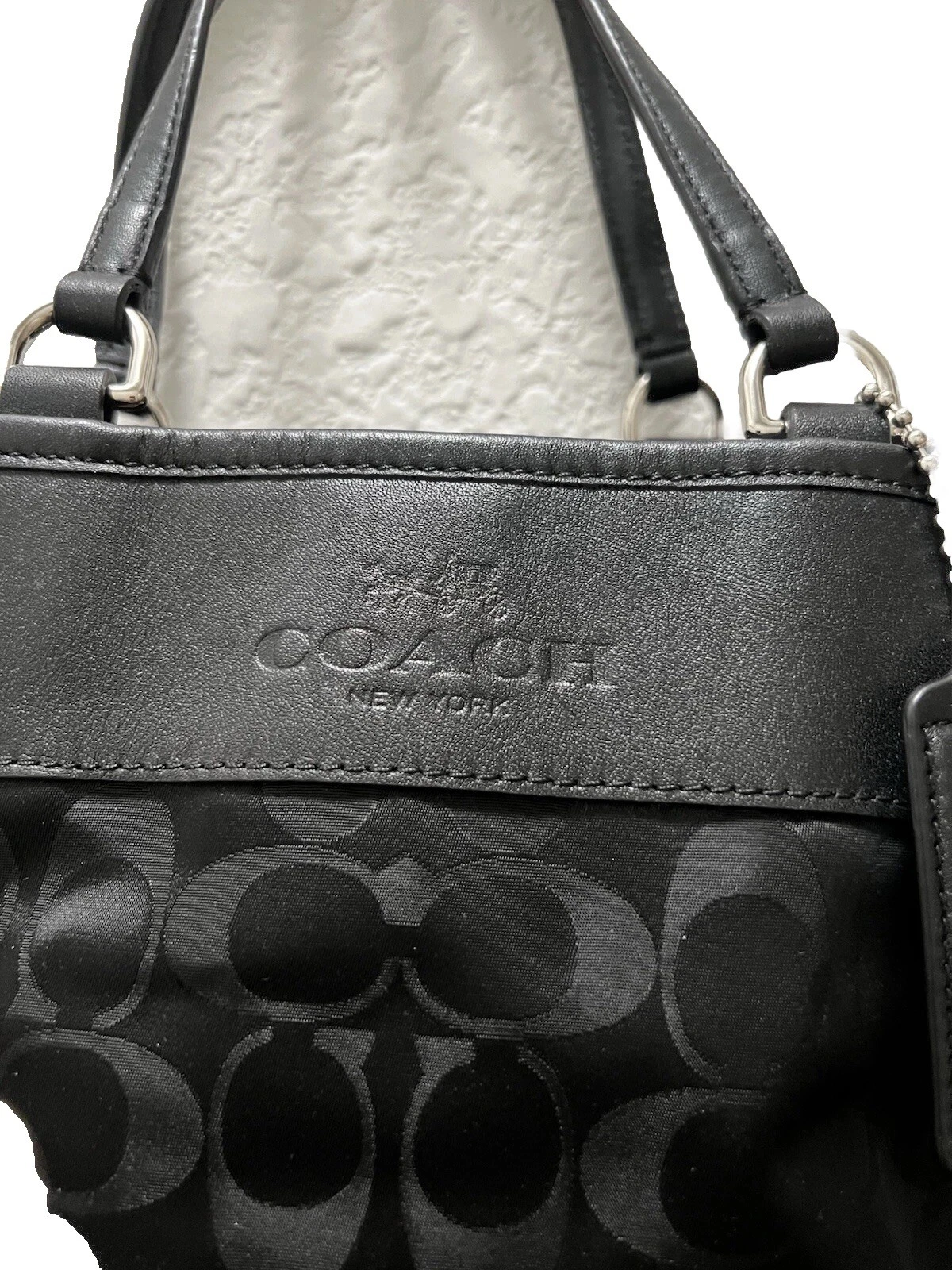 Borsa a tracolla Coach Signture C nera nylon bordo pelle coulisse espansione