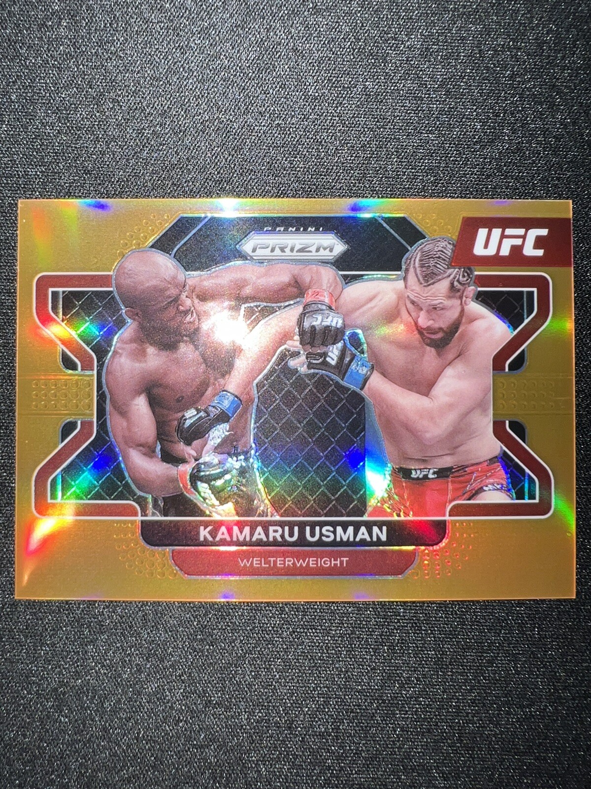 2022 Panini Prizm UFC Prizms Orange #54 Kamaru Usman /99