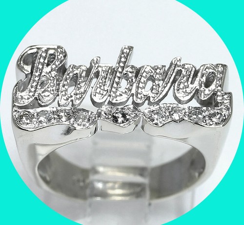 ring 14K WG 9 round brilliants 