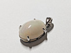 3.60 Ct. Ethiopia Natural White Oval Play-of-Color Opal Silver Pendant 14x10.5mm — photo 4