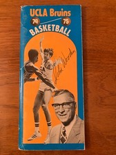 1974-75 UCLA BRUINS MEDIA GUIDE AUTOGRAPHED BY JOHN WOODEN PSA/DNA