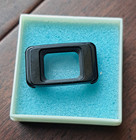 Nikon Eyepiece Correction Lens +0.5 And DK5 Eyepiece Cap.