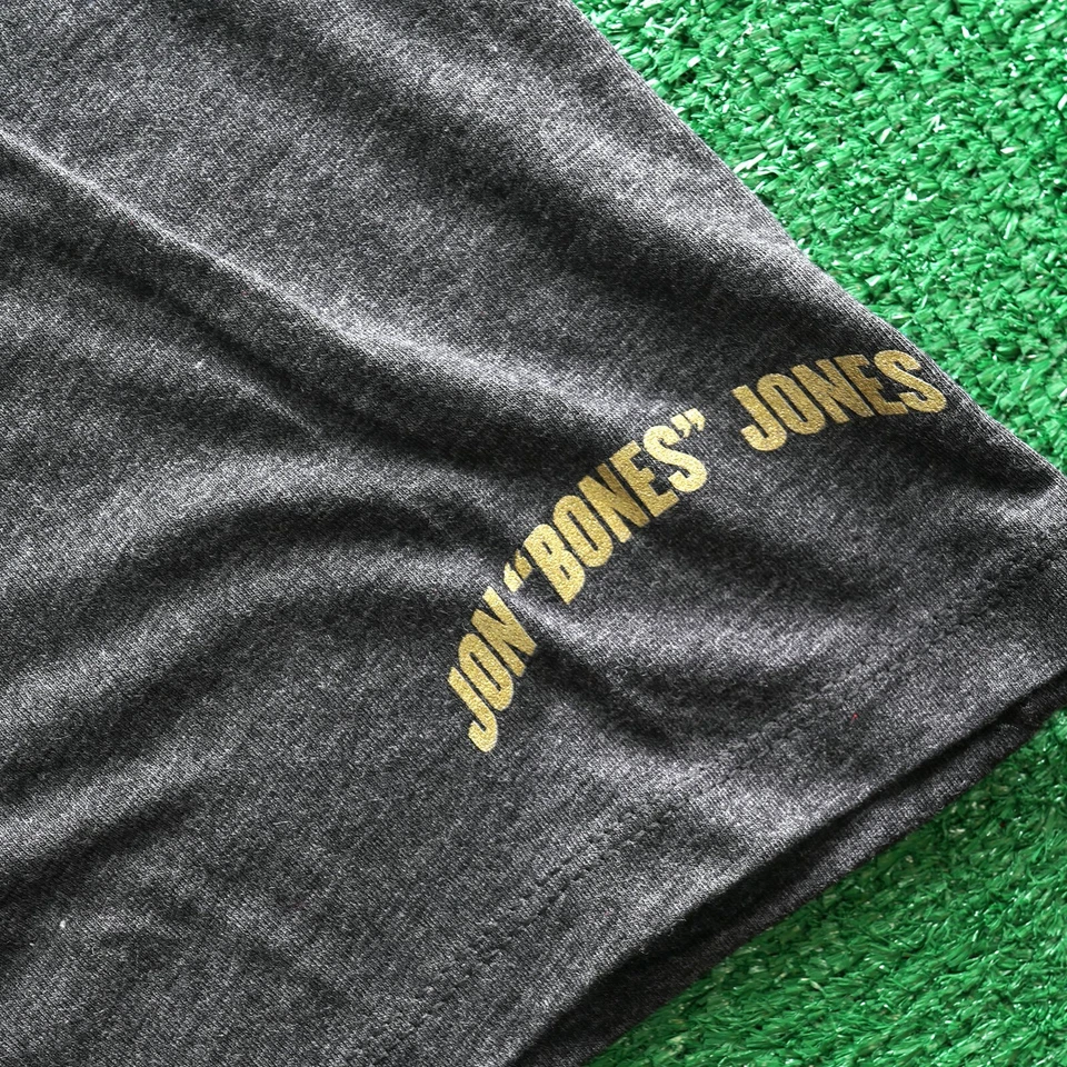 Camiseta para mujer Jon Jones Reebok UFC 182 Champ oficial negra Walkout Foto 4 de 4