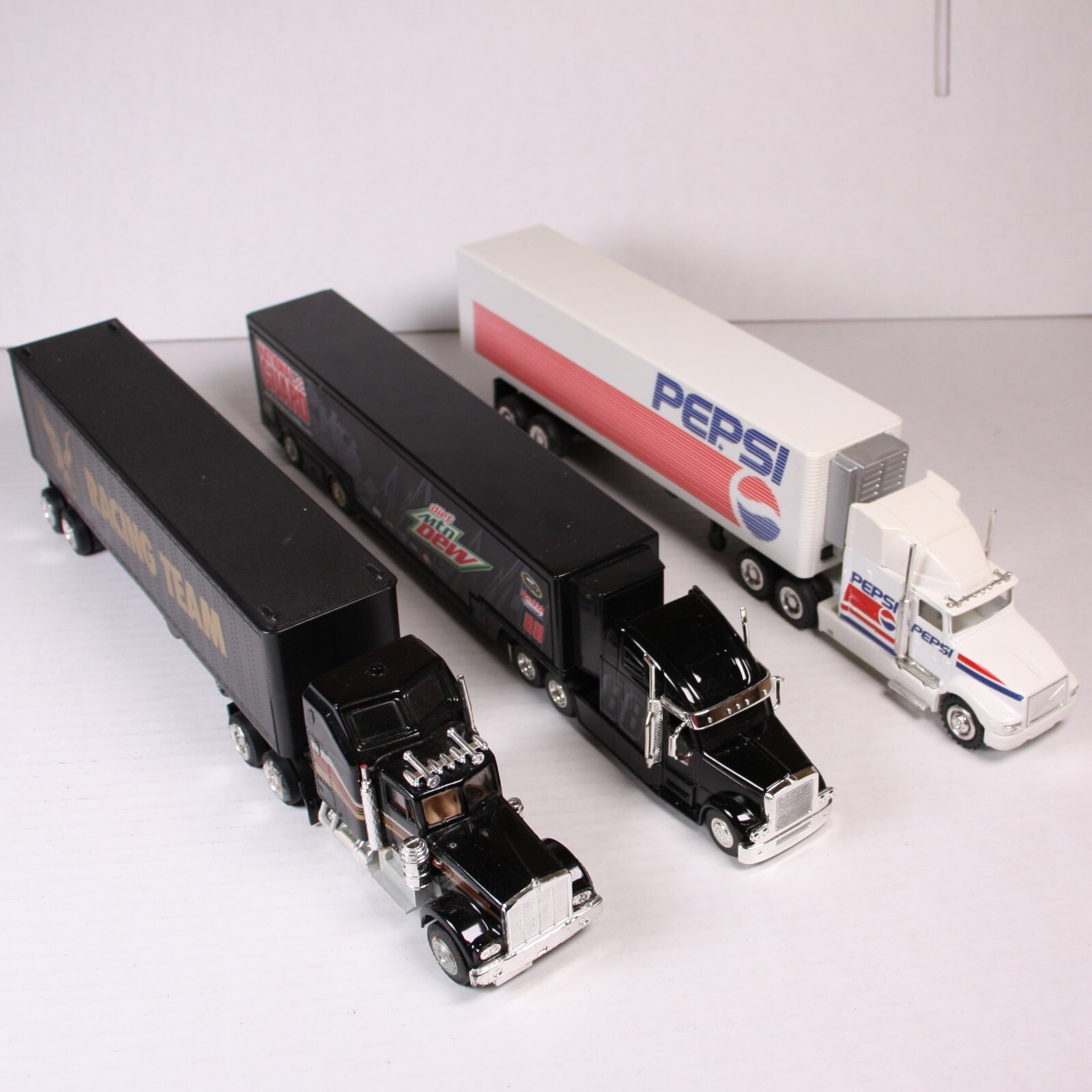 Lot of 3 Diecast Model Trucks - Racing Team, Pepsi, Mountain Dew (303208)