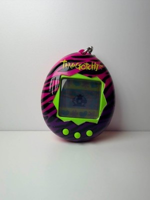 Tamagotchi Bandai Gen 1 Pink Virtual Reality Pet with Zebra Stripes 1.5''