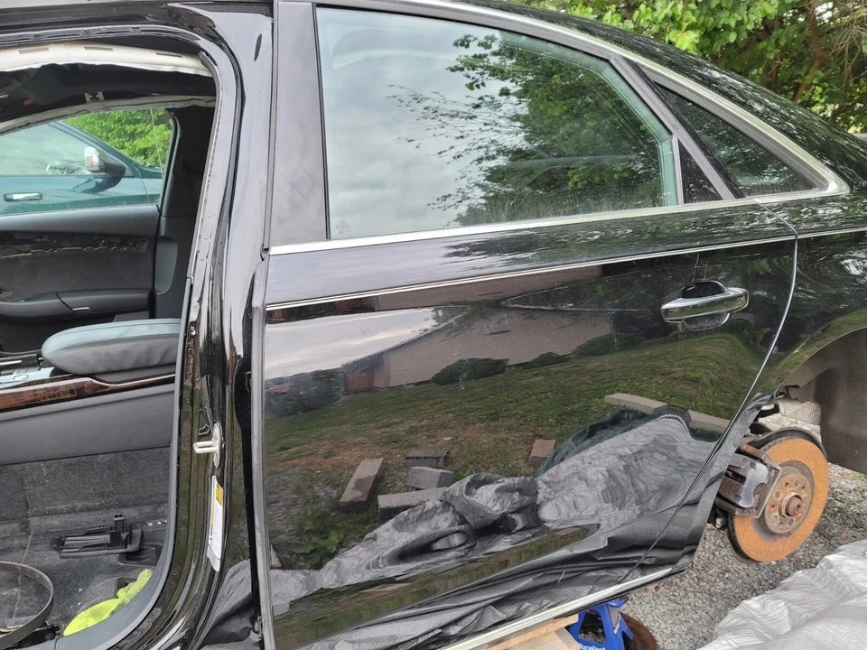 PANEL CARCASA PUERTA LADO CONDUCTOR TRASERO IZQUIERDO AUDI A8 S8 OEM 2011-2017 Foto 2 de 3