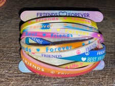 Claire  s 12 Piece BFF Best Friends Rainbow Rubber Bracelet Jewelry Set