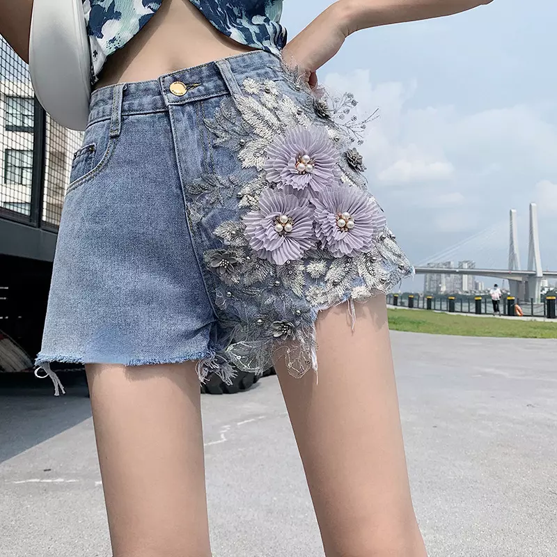 Denim shorts with store embroidered flowers