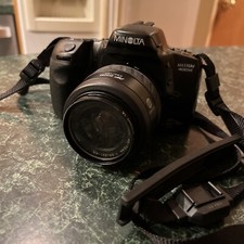 Minolta Maxxum 400SI 35mm SLR Camera 35-70 AF Zoom And Sigma 300 Zoom Lens  Bag
