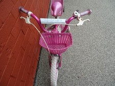 child girl bike in pink