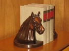Vintage 1940's set of two horse head bookends. Heavy weight. — photo 1