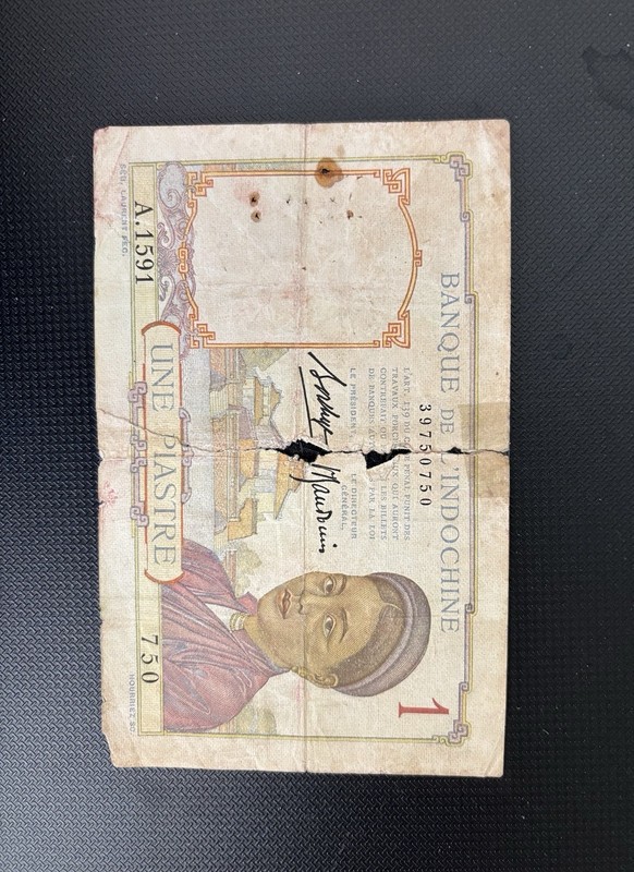One Very Old Indochina French Colonial One Piastre Bank Note Damaged