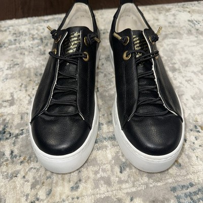 Paul Green Faye Sneakers in a black and gold combination. Size 38