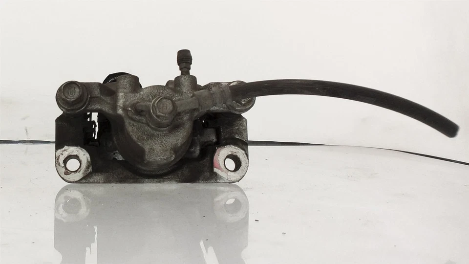 Pinza de freno trasera izquierda Nissan Rogue 2016-2019 tracción delantera OEM 44011-3NK0A Foto 3 de 4