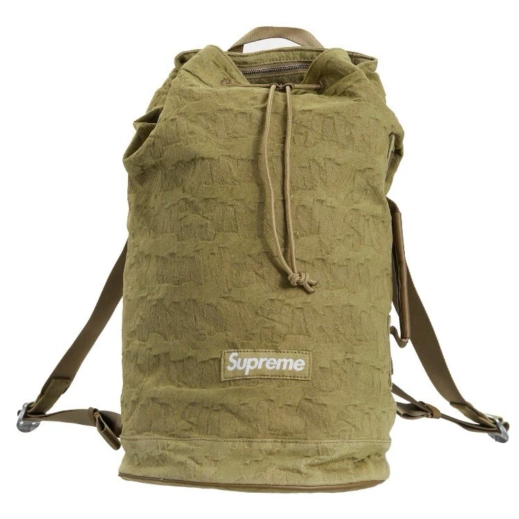 Sac à dos en denim jacquard Supreme Fat Tip olive