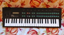Yamaha DX100 Synthesizer Keyboard with PortaSound case (Tested Working)