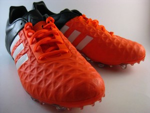 botines adidas naranja y negro