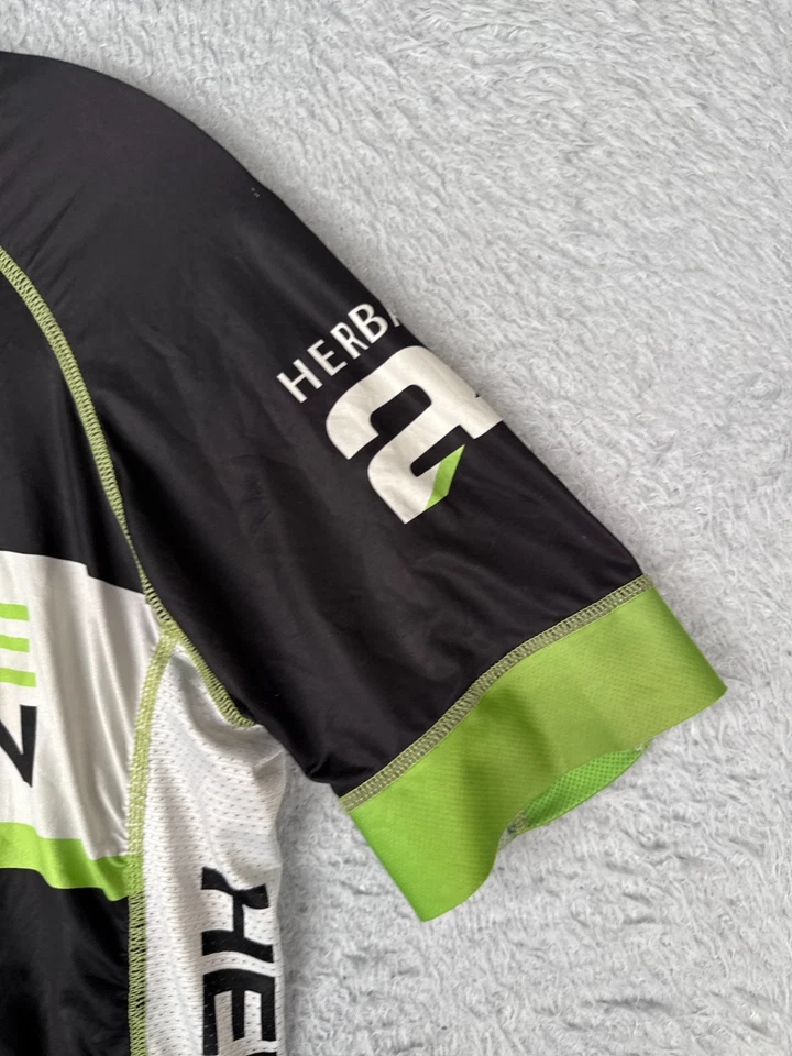 Camiseta deportiva de ciclismo Hincapi para mujer verde mediana negra Herbalife cremallera completa manga corta Foto 2 de 4