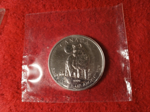 2011 1 oz Silver CANADIAN WILDLIFE COIN TIMBER WOLF ORIGINAL RMC WRAP - Picture 1 of 6