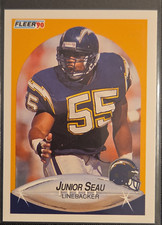 Fleer 1990 Update Junior Seau San Diego Chargers #U-102 Rookie NFL Card. rookie card picture