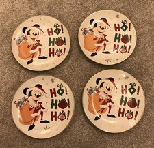 DISNEY STORE  MICKEY MOUSE CHINA CHRISTMAS SET OF 4 PLATES CIRCUMFERENCE 20 CMS
