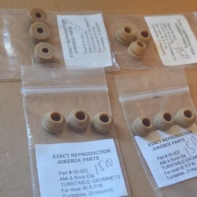 (12) Rock-Ola/AMI Turntable Grommets NEW