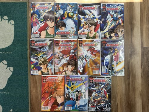 Mobile Suit Gundam Wing collezione fumetti 2-12 set quasi completo 2001 B&B ottimo stato+ - Foto 1 di 10