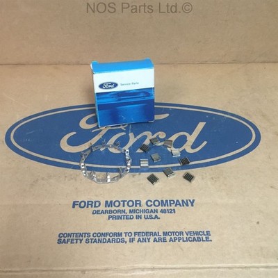 NOS OEM FORD 74 75 76 77 78 MUSTANG II PINTO D4ZZ-7D191-A CAGE - SPRING & ROLLER