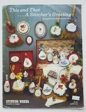 SPINNING WHEEL 110 This &That CHRISTMAS GREETING cross stitch  16pg booklet 1983