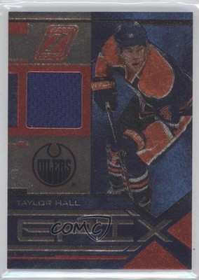 2010-11 Zenith Epix Dare to Tear Materials 60/100 Taylor Hall #44 Rookie RC 0i6