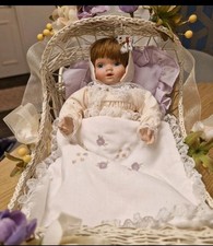 Ashton Drake Porcelain baby doll, with metal pram  immaculate condition 
