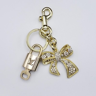 Louis Vuitton Authentic Gold Lock & Key   Bag Charm + Unbranded Ribbon Keychain