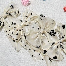 Ladies' bow hair accessory