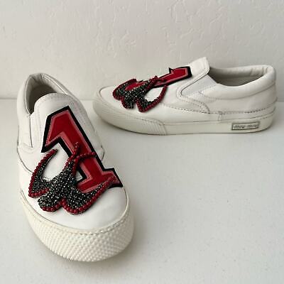 Miu Miu Embellished Patch Logo Slip-On Leather Sneakers Miu Miu Embellished Patch Logo Slip-On Leather Sneakers