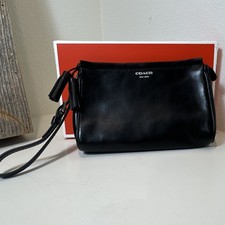 Coach New York Black Zip Crossbody Bag Tassel Detachable Strap Inner Pockets