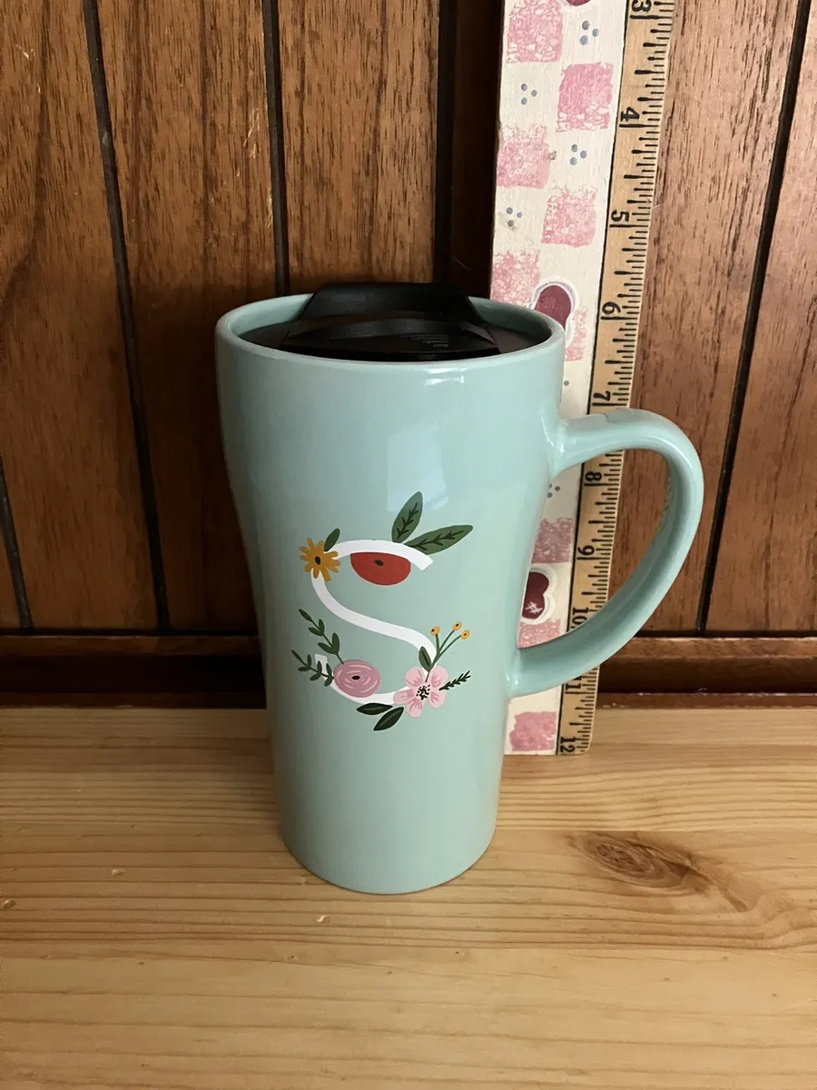 Clay Art, Pretty Ceramic Travel Mug with Flowers decorating the Letter S.
