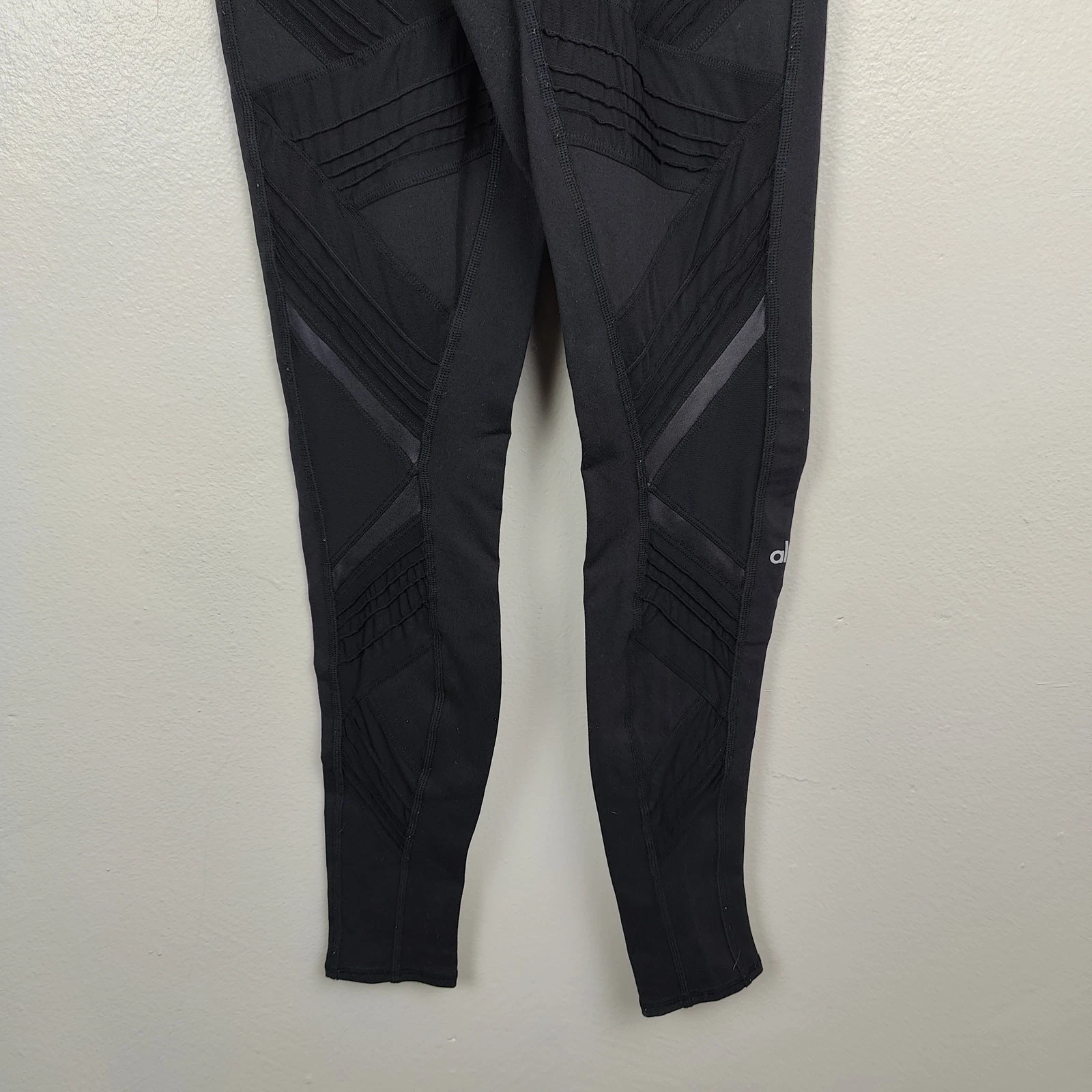 alo-yoga radiance eyelet patterned cut-out moto leggings