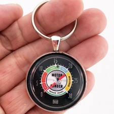 Vintage Stewart Warner Vacuum Motor Minder 1.2 Diameter Keychain