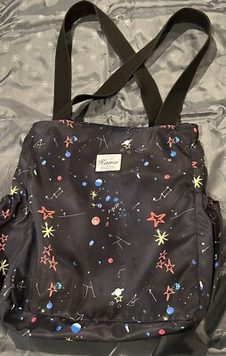 Kamo light weight, waterproof black tote bag with stars and planets design.