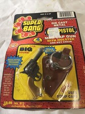 Revolver Super Bang Strip Cap Pistol 912 Keychain NEW on card Rare Vintage