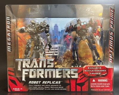 Transformers Robot Replica Optimus Prime vs Megatron Battle Damaged Set New