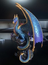 Blue And Yellow Dragon On Rock Pillar With Gl...