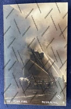Antique 1909 RPPC Peoria Illinois Model Store fire active Real Photo Postcard