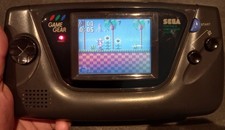 Sega Game Gear Handheld Retro Console with Sonic the Hedgehog. Reccaped