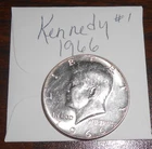 1966 KENNEDY HALF - ABOUT UNCIRCULATED -  SOME SURFACE IMPERFECTIONS - #1