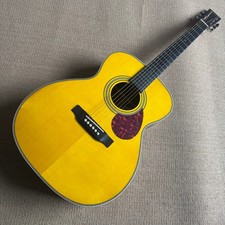 yellow acoustic guitar with 6 strings in stock