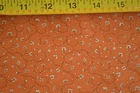 By 1/2 Yd, Cream Calico on Rusty-Orange Cotton, RJR/Hasegawa/Sweet Victoria, B45